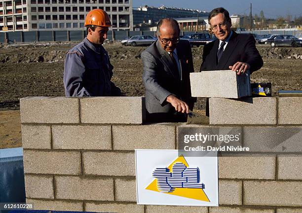 French businessman Francis Bouygues and journalist and president of TF1, Patrick Le Lay at the construction site of the new TF1 headquarters in...