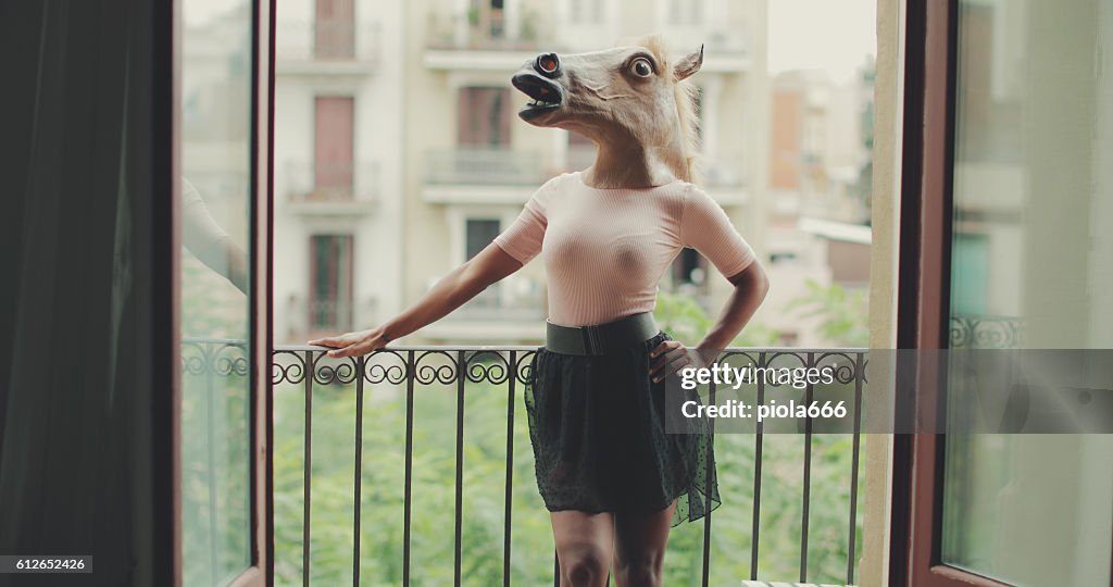 Beautiful black woman portrait with horse head