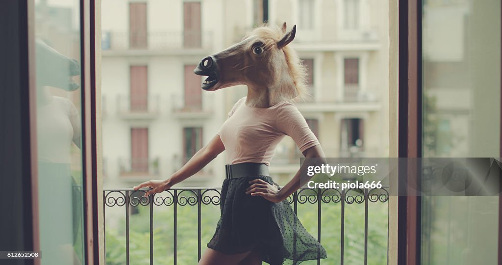 Beautiful black woman portrait with horse head