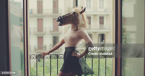 beautiful black woman portrait with horse head - ironia imagens e fotografias de stock