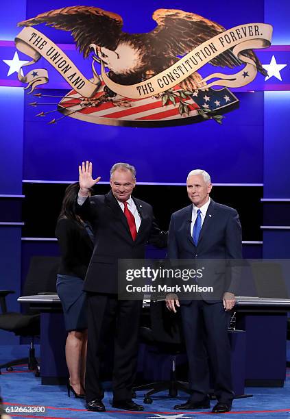 Democratic vice presidential nominee Tim Kaine and Republican vice presidential nominee Mike Pence stand on stage prior to the Vice Presidential...