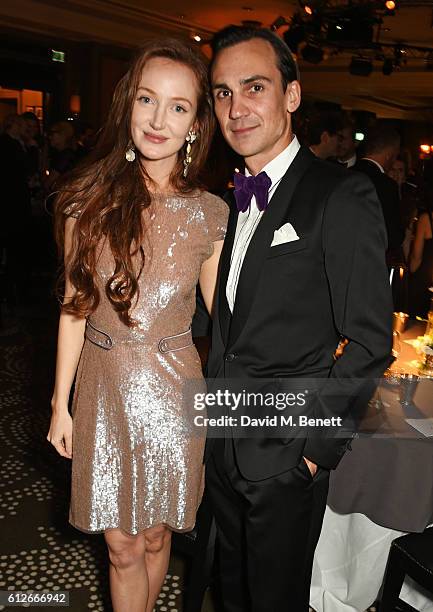 Olivia Grant and Henry Lloyd Hughes attend the IWC Schaffhausen Dinner in Honour of the BFI at Rosewood London on October 4, 2016 in London, England.