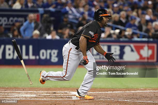 Michael Bourn of the Baltimore Orioles hits a single in the fifth inning against the Toronto Blue Jays during the American League Wild Card game at...