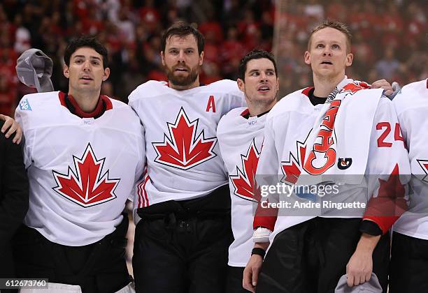 Team Canada sings their national anthem during Game Two of the World Cup of Hockey final series at the Air Canada Centre on September 29, 2016 in...