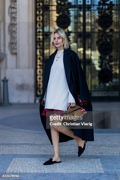German fashion blogger Lisa Hahnbueck wearing Anya Hindmarch Oversize Coat, H&M Trend Knitdress, Storets Metallic Plissee Skirt, Alberta Ferretti...