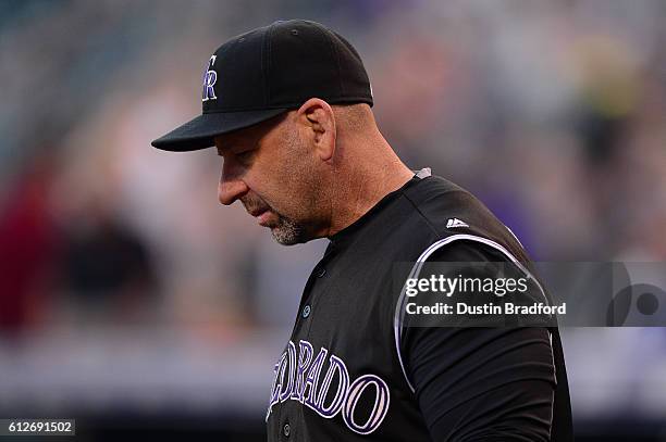 Walt Weiss of the Colorado Rockies walks onto the field before a game against the Milwaukee Brewers at Coors Field on September 30, 2016 in Denver,...