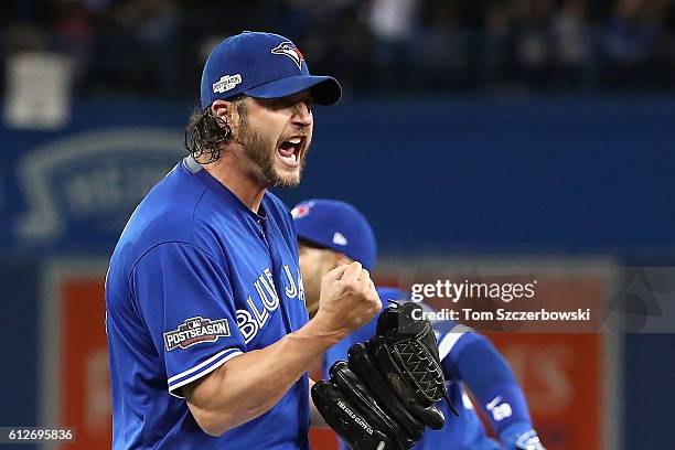 Jason Grilli of the Toronto Blue Jays reacts after the third out in the eighth inning against the Baltimore Orioles during the American League Wild...