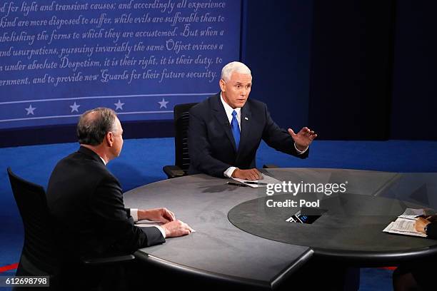 Democratic vice presidential nominee Tim Kaine and Republican vice presidential nominee Mike Pence debate during the Vice Presidential Debate at...