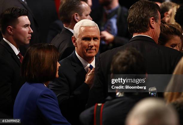 Mike Pence, 2016 Republican vice presidential nominee, center, greets attendees after the vice presidential debate at Longwood University in...