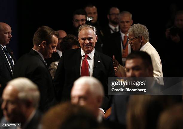 Tim Kaine, 2016 Democratic vice presidential nominee, center, greets attendees after the vice presidential debate at Longwood University in...