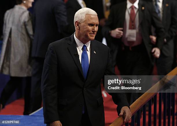 Mike Pence, 2016 Republican vice presidential nominee, stands after the vice presidential debate at Longwood University in Farmville, Virginia, U.S.,...