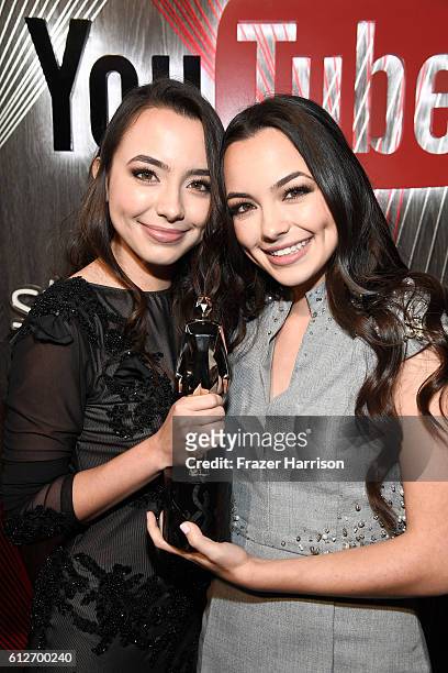 Internet personalities Veronica Merrell and Vanessa Merrell pose with the Live award during the 6th annual Streamy Awards hosted by King Bach and...