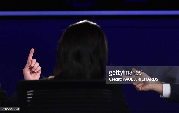 Democratic vice presidential candidate Tim Kaine and Republican vice presidential candidate Mike Pence take questions from moderator Elaine Quijano...