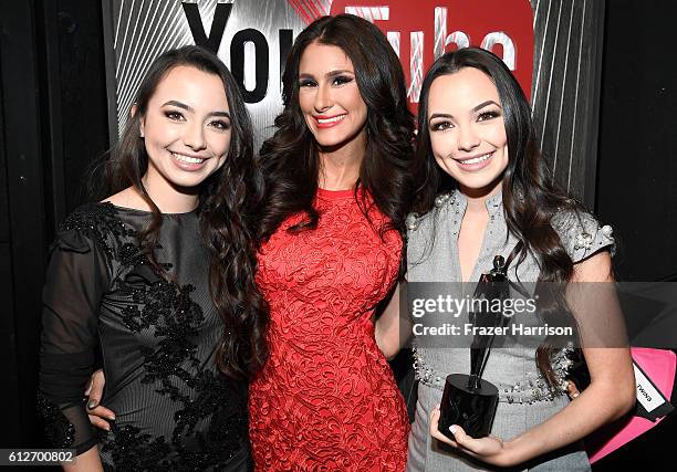 Internet personalities Veronica Merrell, Brittany Furlan and Vanessa Merrell pose with the Live award during the 6th annual Streamy Awards hosted by...