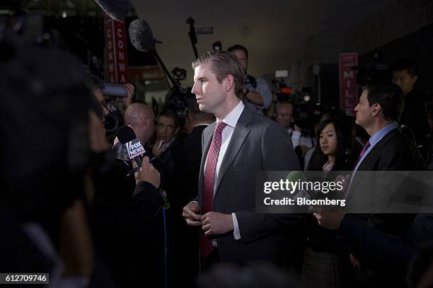 Eric Trump, son of Republican Presidential Nominee Donald Trump, center, speaks during an interview following the vice presidential debate at...