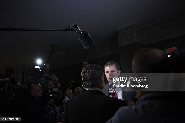 Eric Trump, son of Republican Presidential Nominee Donald Trump, center, speaks during an interview following the vice presidential debate at...