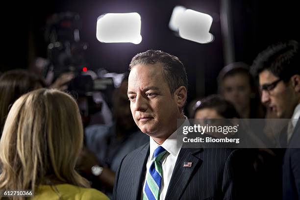 Reince Priebus, chairman of the Republican National Committee, speaks to the media following the vice presidential debate at Longwood University in...