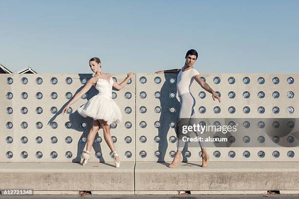 ballet dancers performance in the city - urban ballet stockfoto's en -beelden