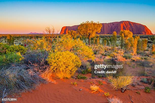 uluru sunrise - uluru rock stock pictures, royalty-free photos & images