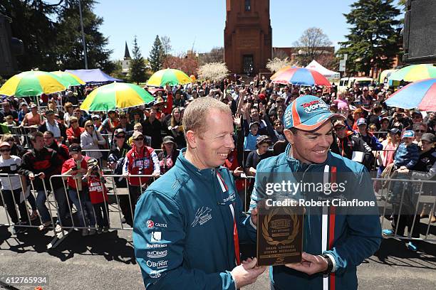 Steven Richards and Craig Lowndes of Team Vortex are presented with the winners plaque for their win in 2015 during the drivers parade ahead of the...