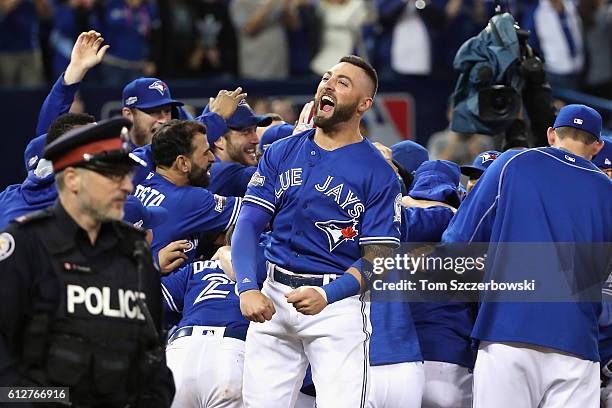 Kevin Pillar of the Toronto Blue Jays celebrates defeating the Baltimore Orioles 5-2 in the eleventh inning to win the American League Wild Card game...