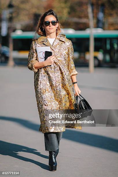 Miroslava Duma is seen, outside the Chanel show, during Paris Fashion Week Spring Summer 2017, at Grand Palais, on October 4, 2016 in Paris, France.