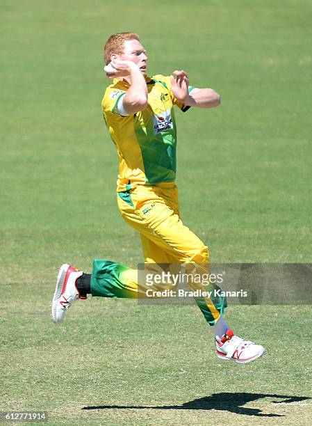 Liam Hatcher of the CA XI bowls during the Matador BBQs One Day Cup match between Tasmania and the Cricket Australia XI at Allan Border Field on...