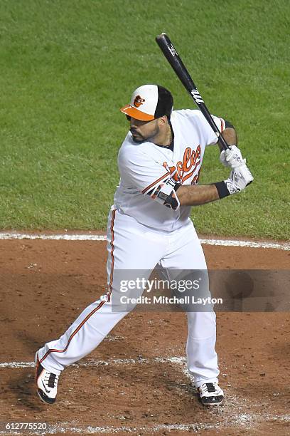 Pedro Alvarez of the Baltimore Orioles prepares for a pitch during a baseball game against the Boston Red Sox at Oriole Park at Camden Yards on...