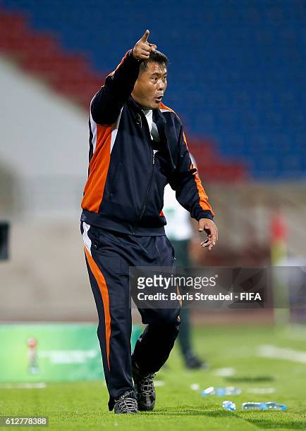 Head coach Jong Bok Sin of Korea DVR gestures during the FIFA U-17 Women's World Cup Jordan Group C match between Brazil and Korea DPR at Prince...
