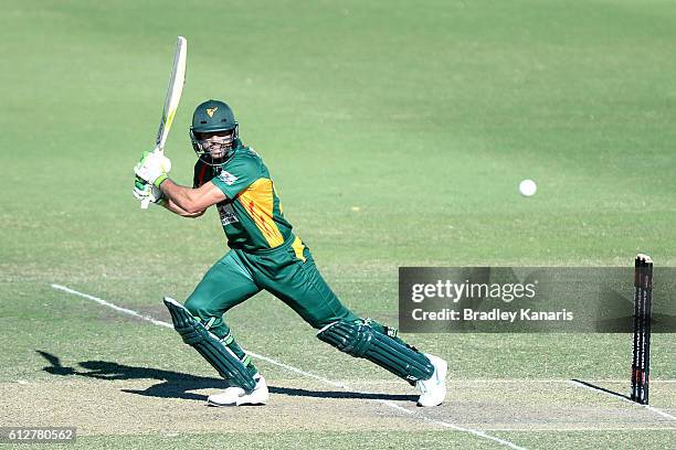 Dominic Michael of Tasmania plays a shot during the Matador BBQs One Day Cup match between Tasmania and the Cricket Australia XI at Allan Border...