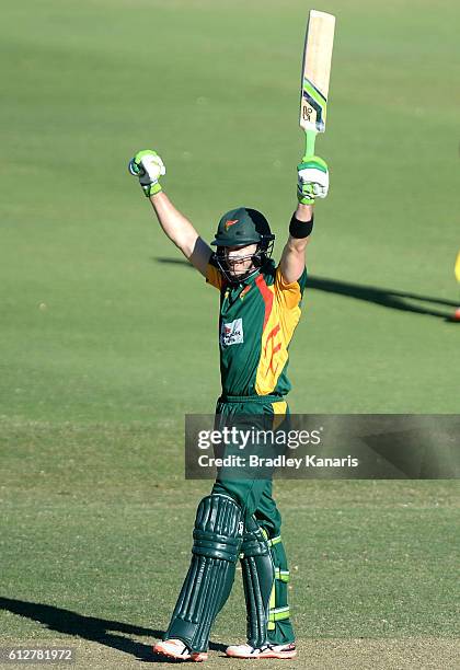 Tim Paine of Tasmania celebrates scoring a century during the Matador BBQs One Day Cup match between Tasmania and the Cricket Australia XI at Allan...