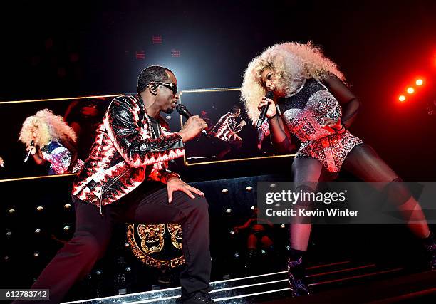 Sean "Diddy" Combs and Lil' Kim perform onstage during the Bad Boy Family Reunion Tour at The Forum on October 4, 2016 in Inglewood, California.