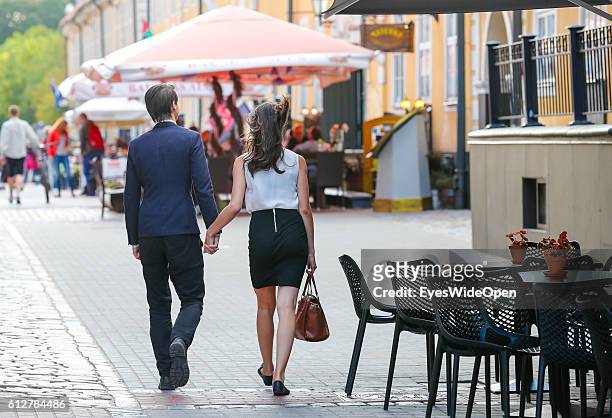 Restaurant and bar with people in the Old Town and Brick Wall on September 02, 2016 in Riga, Latvia "n