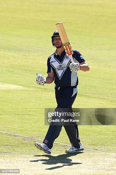 Cameron White of the Bushrangers celebrates after scoring his century during the Matador BBQs One Day Cup match between South Australia and Victoria...