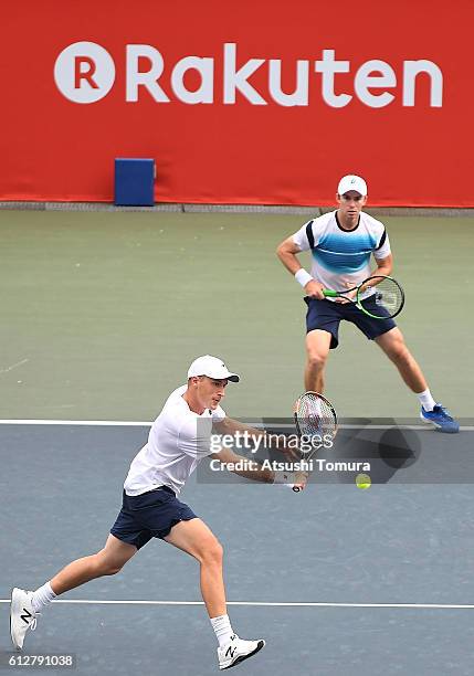 Henri Kontinen of Finland and John Peers of Australia in action during the men's doubles first round match against Robert Lindstedt of Sweden and...