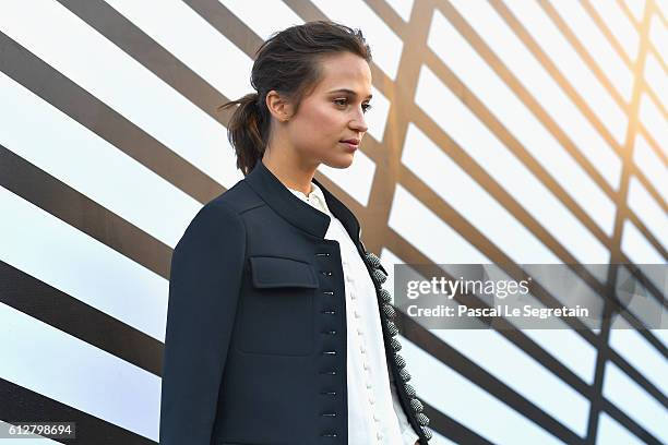 Alicia Vikander attends the Louis Vuitton show as part of the Paris Fashion Week Womenswear Spring/Summer 2017 on October 5, 2016 in Paris, France.