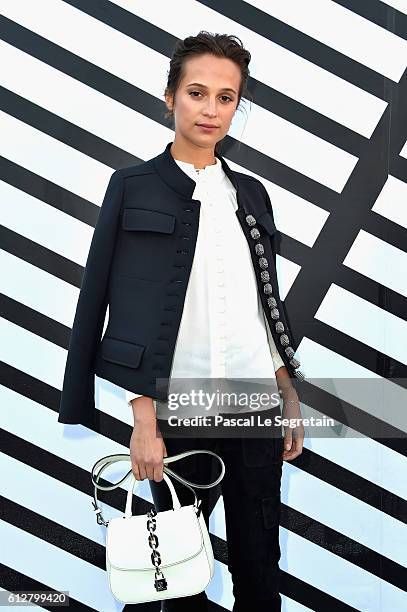 Alicia Vikander attends the Louis Vuitton show as part of the Paris Fashion Week Womenswear Spring/Summer 2017 on October 5, 2016 in Paris, France.