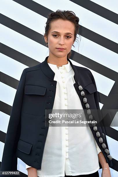 Alicia Vikander attends the Louis Vuitton show as part of the Paris Fashion Week Womenswear Spring/Summer 2017 on October 5, 2016 in Paris, France.