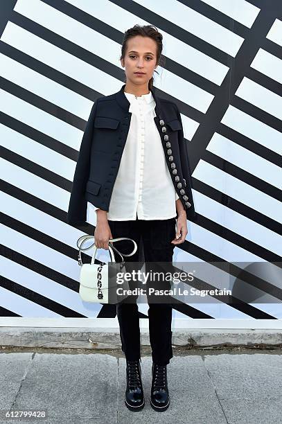 Alicia Vikander attends the Louis Vuitton show as part of the Paris Fashion Week Womenswear Spring/Summer 2017 on October 5, 2016 in Paris, France.