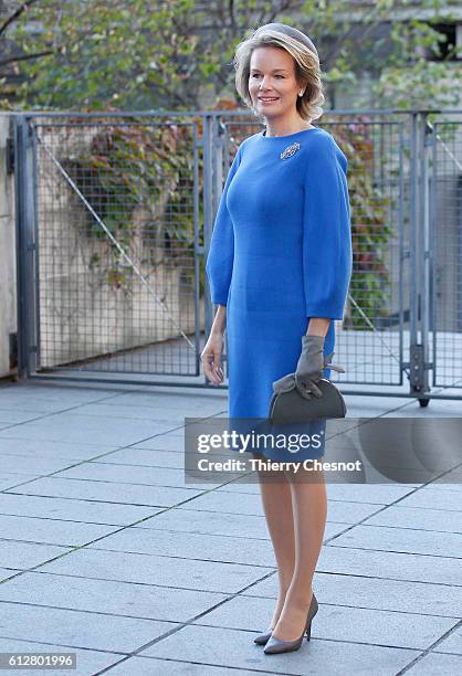 Queen Mathilde of Belgium arrives at the Centre Pompidou museum to visit the exhibition 'Magritte: La Trahison des images' on October 5, 2016 in...