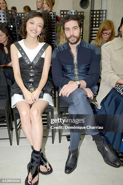 Tahar Rahim and a guest attend the Louis Vuitton show as part of the Paris Fashion Week Womenswear Spring/Summer 2017 on October 5, 2016 in Paris,...