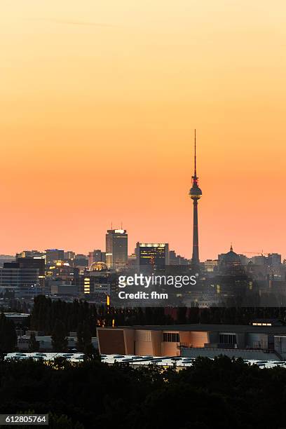 berlin, germany - skyline with famous tv-tower in a colorful sunset - television tower berlin stock pictures, royalty-free photos & images