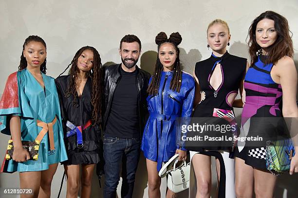 Chloe Bailey, Halle Bailey, Nicolas Ghesquiere, Sasha Lane, Sophie Turner and Caitriona Balfe attend the Louis Vuitton show as part of the Paris...