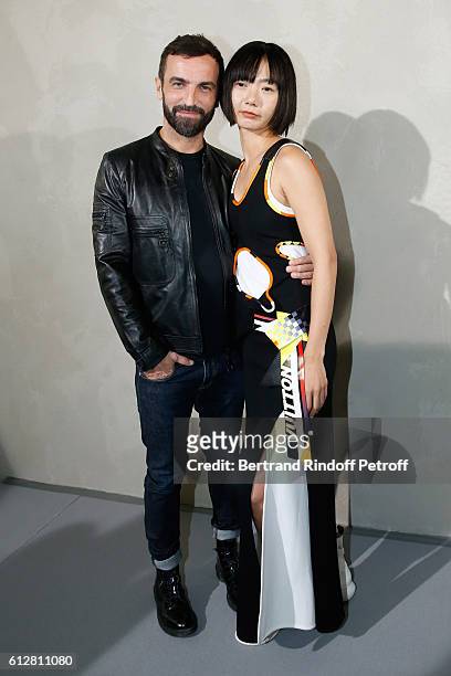 Stylist Nicolas Ghesquiere and actress Doona Bae pose after the Louis Vuitton show as part of the Paris Fashion Week Womenswear Spring/Summer 2017 on...