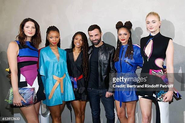 Caitriona Balfe, Chloe Bailey, Halle Bailey, Stylist Nicolas Ghesquiere, Sasha Lane and Sophie Turner pose after the Louis Vuitton show as part of...