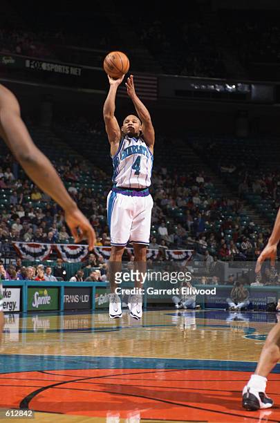 Guard David Wesley of the Charlotte Hornets shoots a jump shot during the NBA game against the Boston Celtics at Charlotte Colesium in Charlotte,...