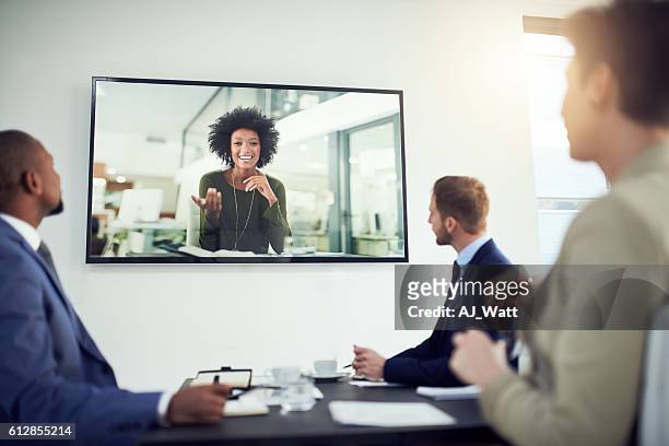 nothing is lost in translation thanks to video calling - projection screen stock pictures, royalty-free photos & images