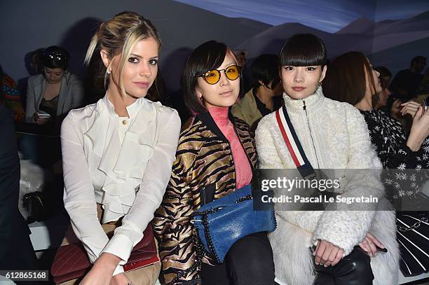 Lala Rudge, Yuki, Kozue Akimoto attend the Moncler Gamme Rouge show as part of the Paris Fashion Week Womenswear Spring/Summer 2017 on October 5,...