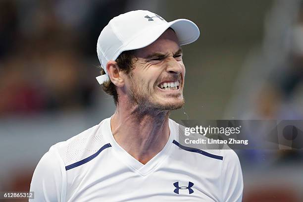 Andy Murray of Great Britain reacts after losing the point against Andrey Kuznetsov of Russia during the Men's singles second round match on day five...