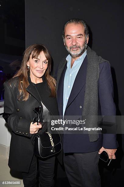 Remo Ruffini and guest attends the Moncler Gamme Rouge show as part of the Paris Fashion Week Womenswear Spring/Summer 2017 on October 5, 2016 in...